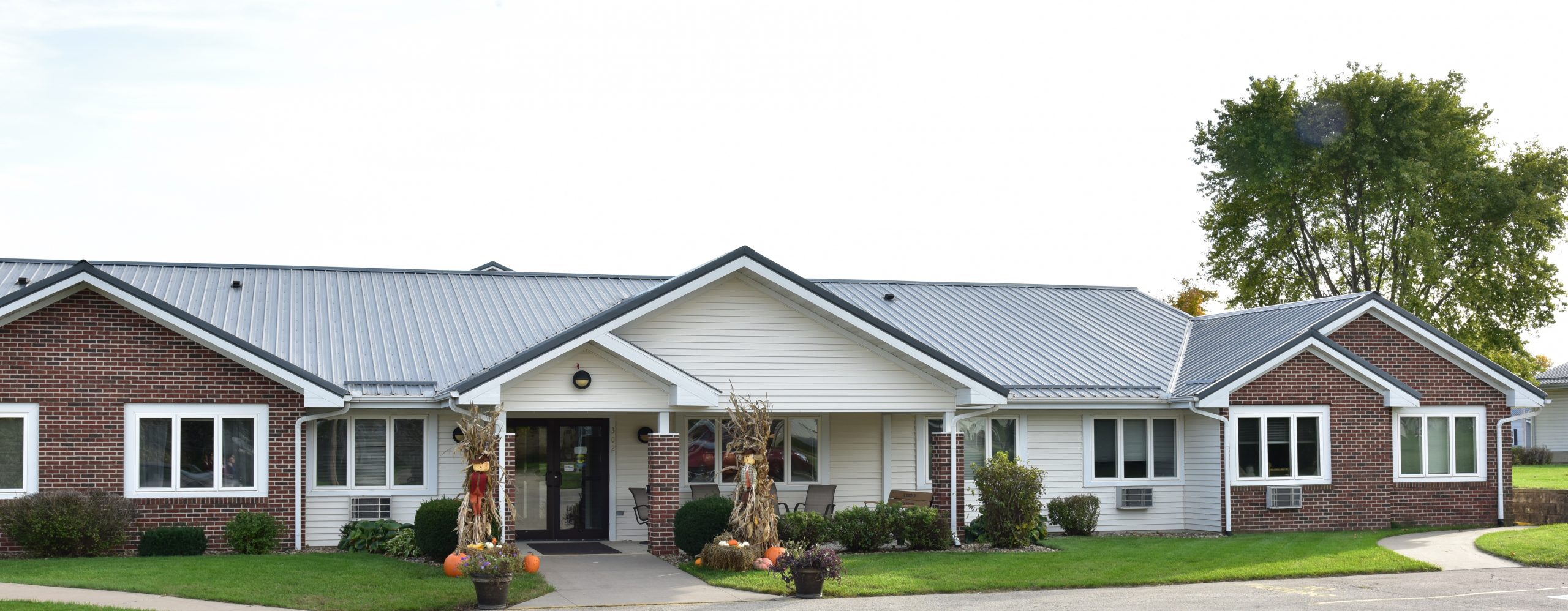 Header image for assisted living displaying front view of a house