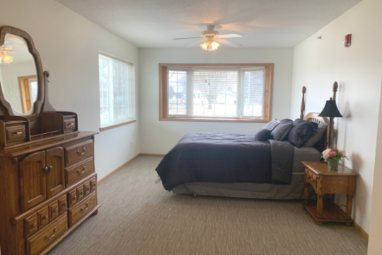 PIcture of bedroom with one bed